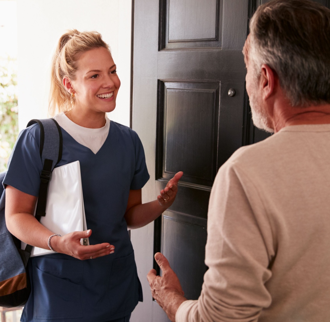 A nurse visits a patient at home representing in-home skilled nursing.